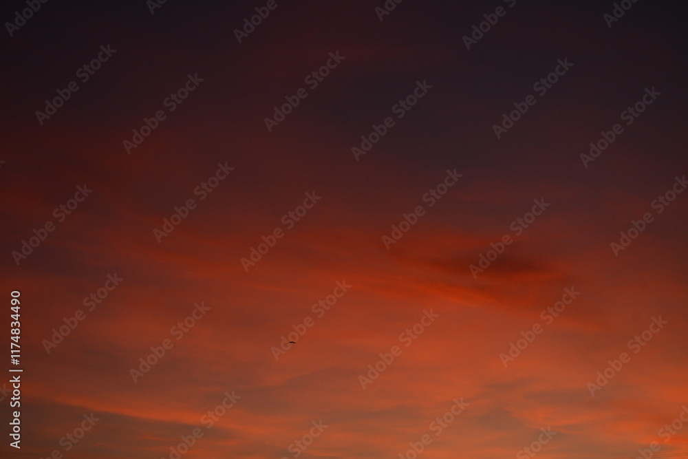 Dark evening sky with orange tint. Background Dark evening sky with orange tint. Background