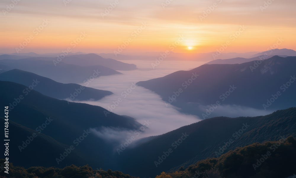 Breathtaking sunset over misty mountains Breathtaking sunset over misty mountains