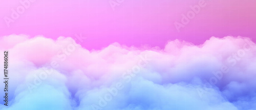 Dense fog envelops a mountain ridge revealing an ethereal landscape at dawn