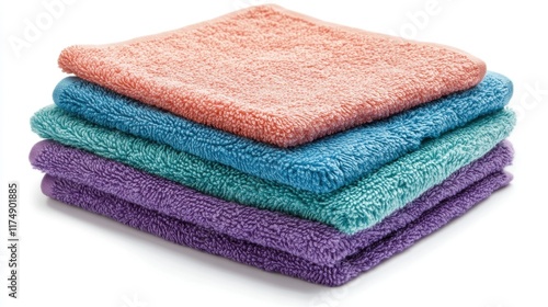 Soft absorbent colorful terry towels. Perfect for bathroom hand face or body drying. Stacked folded neat pile four cloths pastel colors.