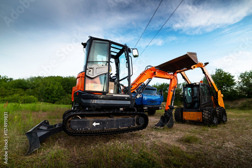 Specialized equipment used in difficult or inaccessible places for excavation and construction. In the photo there is an excavator, a truck, etc photo