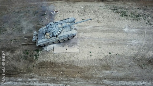 drone view - heavy tank overcomes wall obstacle