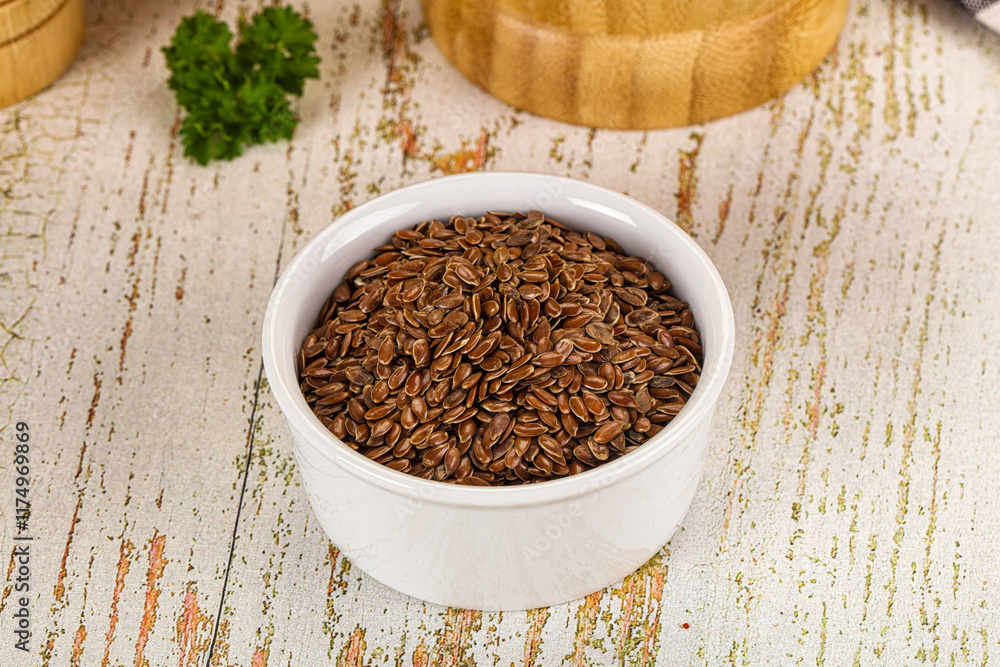 Brown flax seeds in the bowl Brown flax seeds in the bowl