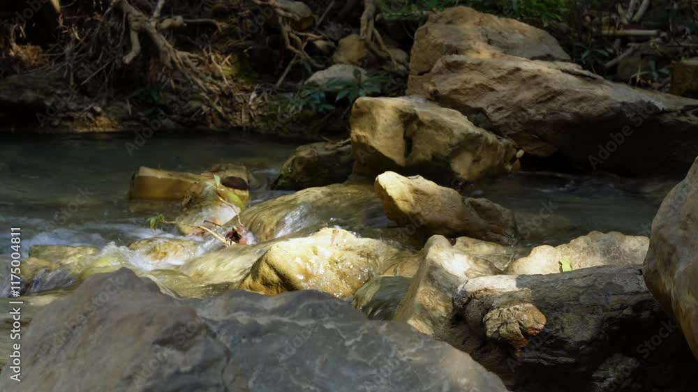 Beautiful waterfall scenery in the tropical rainforest of Thailand. Tad Sado Waterfall, Lamphun Province, Thailand Beautiful waterfall scenery in the tropical rainforest of Thailand. Tad Sado Waterfall, Lamphun Province, Thailand