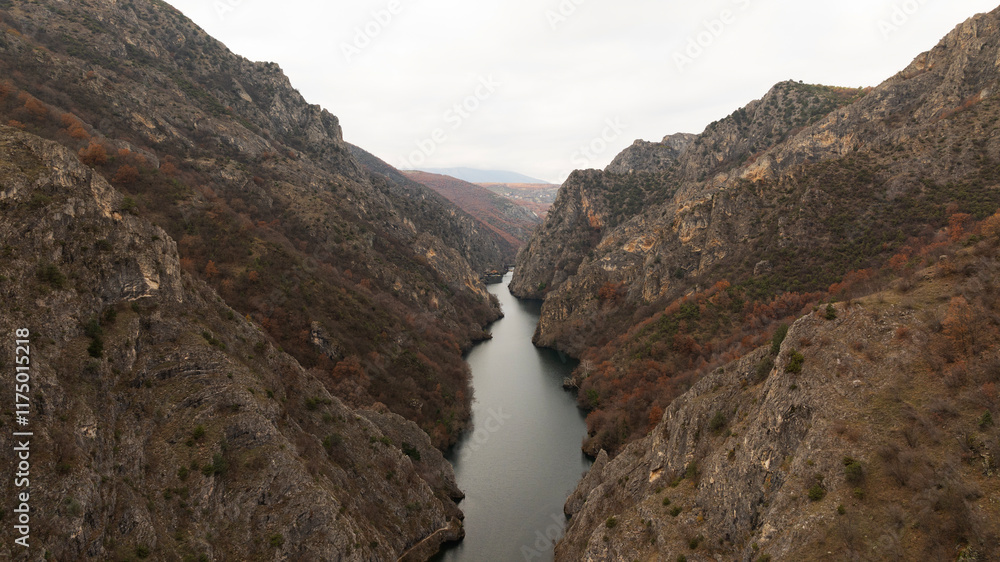 Aerial shot of Matka Canyon in North Macedonia. Flying over long green canyon Matka. Aerial shot of Matka Canyon in North Macedonia. Flying over long green canyon Matka.