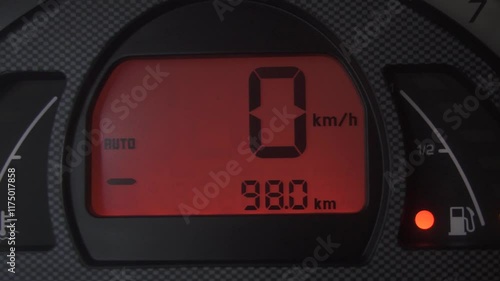 Close-up of digital car dashboard. Digital speedometer, gasoline and temperature gauge