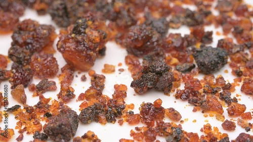 angle view herb CuMoYao or Myrrha or Myrrh Stir-frying with Vinegar rotating at horizontal