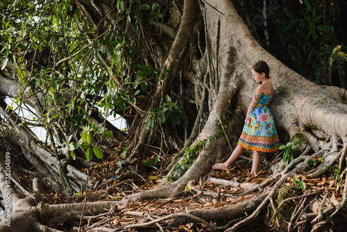 Wallpaper Mural Portrait of a little girl with flowers in a tropical jungle in Thailand Torontodigital.ca