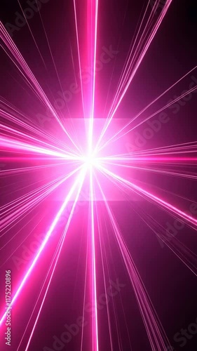 Bright pink laser beams radiate in a dark space creating a vibrant light display