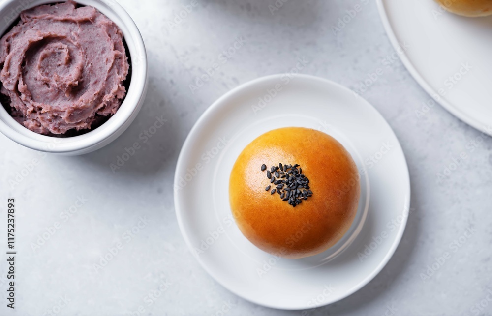 Red bean paste buns with black sesame seeds sprinkles Red bean paste buns with black sesame seeds sprinkles