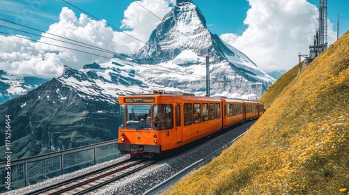 Orange Train Ascending Majestic Swiss Alps Mountain