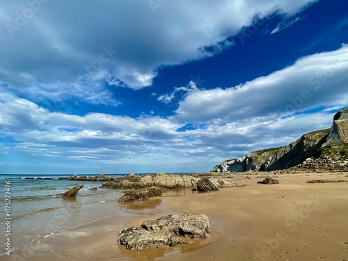 Incredible landscape in Northern Spain. Stony coastline and cloudy sky. 