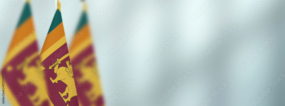 Fototapeta premium Sri Lanka table flags in the office, banner background with space for text