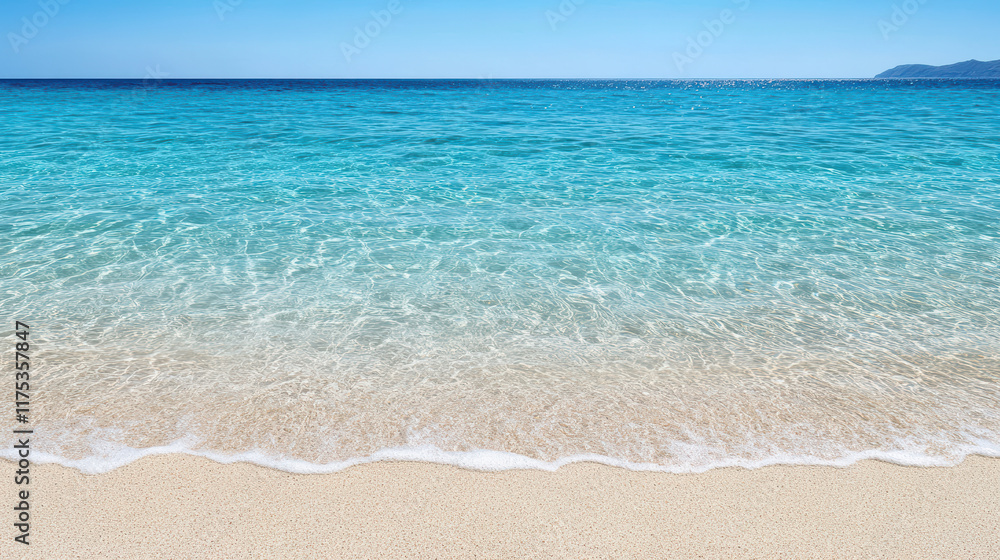 Crystal clear turquoise water meets sandy beach under bright sky Crystal clear turquoise water meets sandy beach under bright sky