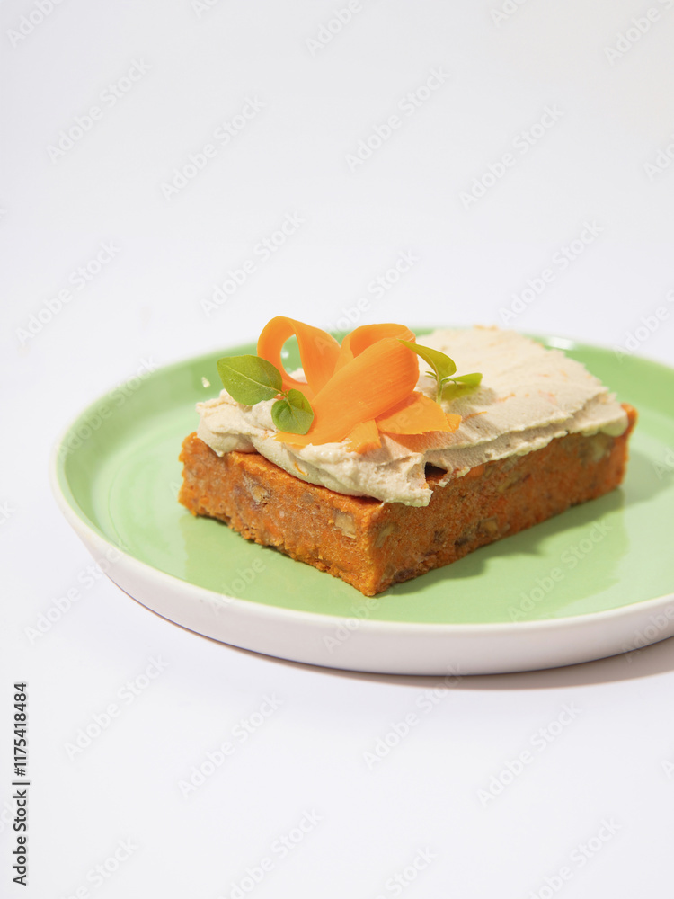 Carrot Cake with Cream Cheese Frosting and Carrot Garnish. A close-up shot of a slice of carrot cake topped with smooth cream cheese frosting, garnished with delicate carrot ribbons and fresh herbs Carrot Cake with Cream Cheese Frosting and Carrot Garnish. A close-up shot of a slice of carrot cake topped with smooth cream cheese frosting, garnished with delicate carrot ribbons and fresh herbs