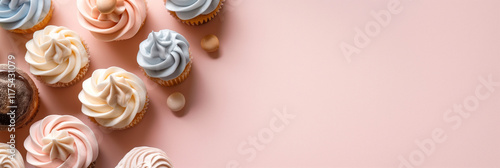 Assorted cupcakes adorned with pastel-colored icing and delicate toppings are beautifully arranged on a soft pink backdrop, appealing to the viewer's sweet tooth.