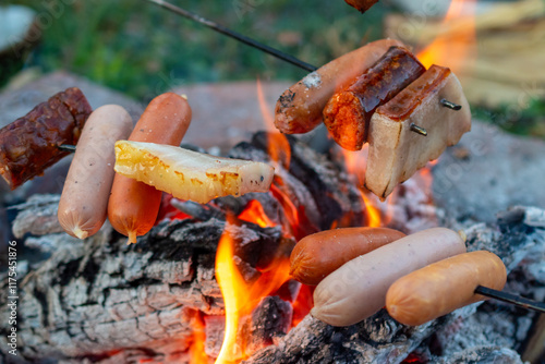 Outdoor activity - bacon in campfire photo