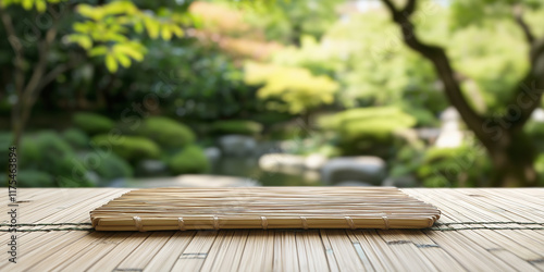 A close-up of a bamboo mat laid out against the soft-focus backdrop of a lush garden, emphasizing tranquility and natural aesthetics in the outdoor setting. photo