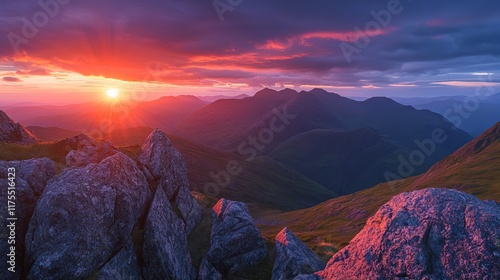 Sunset Majesty: A breathtaking panorama of majestic mountains bathed in the golden hues of a vibrant sunset. Witness nature's grandeur as fiery clouds paint the sky. photo