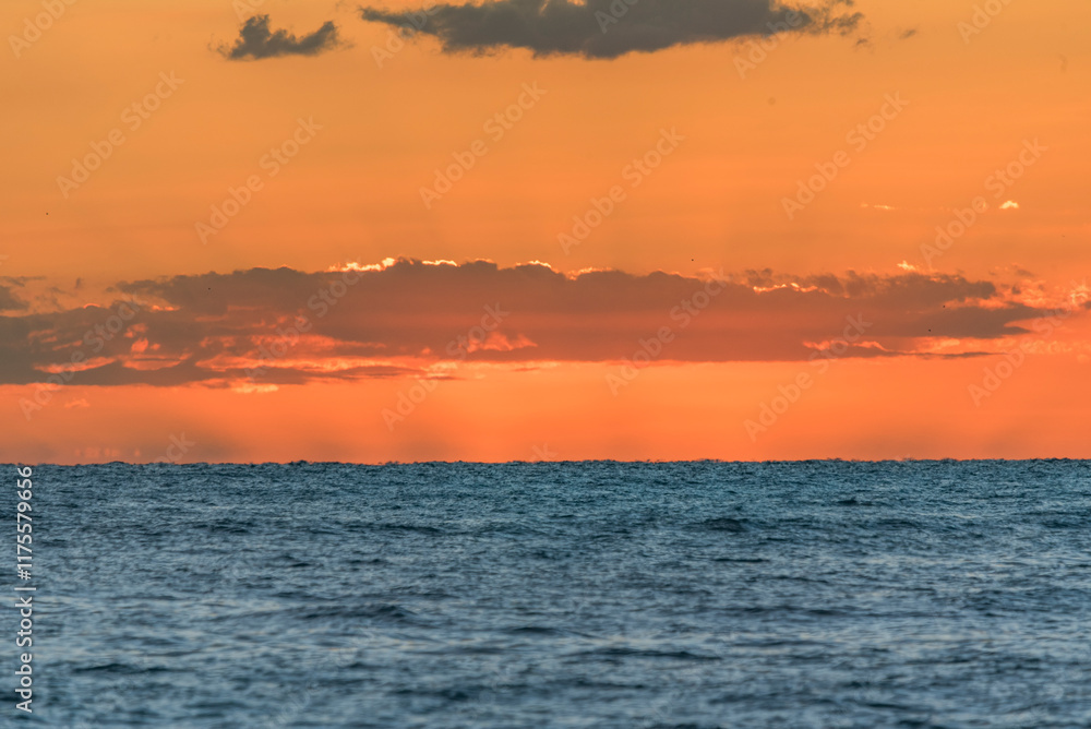 Fototapeta premium Extreme ocean warming during El Nino climate anomaly, golden sun rays reflection - Tsunami warning in the Mediterranean Sea