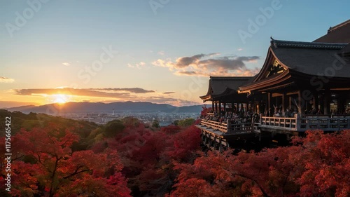 Kyoto Japan time lapse day to night sunset at Kiyomizu dera temple in autumn season