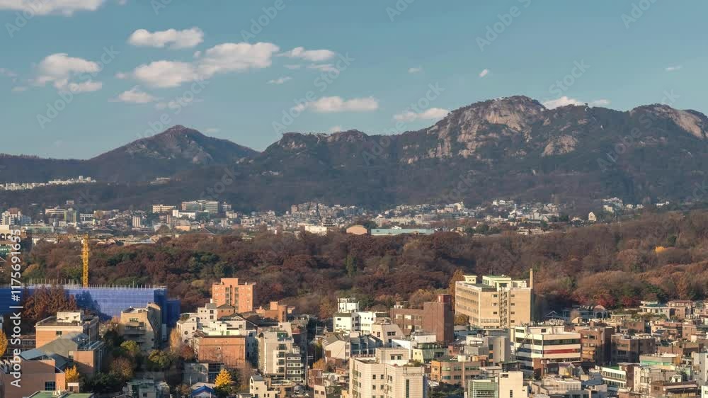 Seoul South Korea time lapse city skyline at city center view from Naksan Park in autumn Seoul South Korea time lapse city skyline at city center view from Naksan Park in autumn