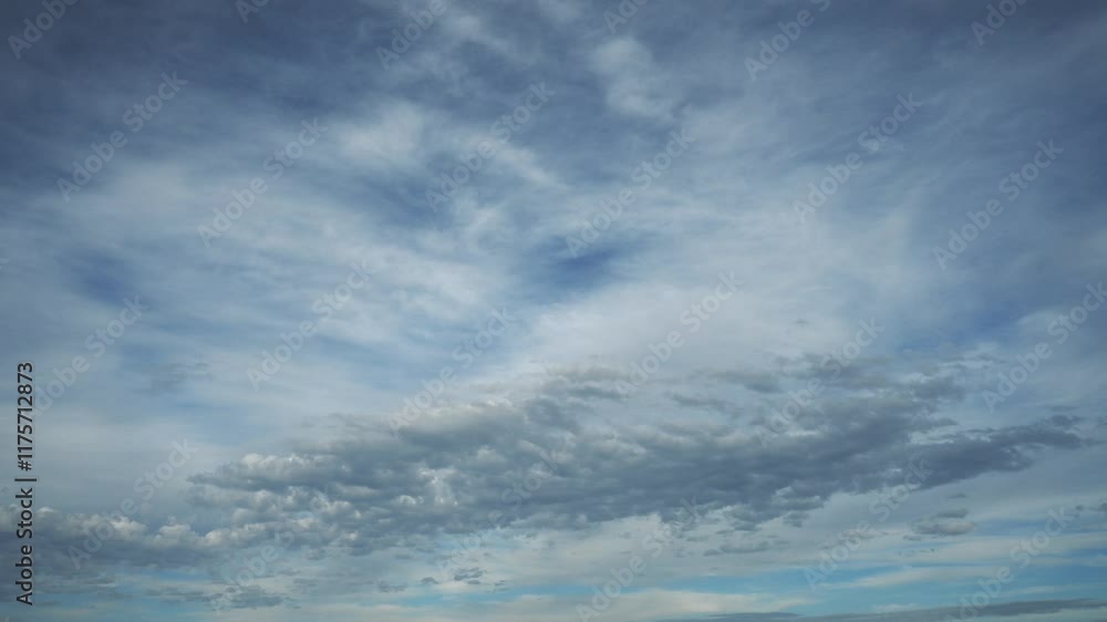 Time lapse of blueish spring clouds moving through a blue sky. Only clouds shown
Time lapse of blueish spring clouds moving through a blue sky. Only clouds shown