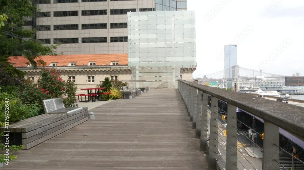 New York City waterfront park, Financial district, Manhattan Downtown riverfront Elevated Acre, Water street. Highway along East river, waterside FDR drive. Brooklyn Bridge, United States architecture New York City waterfront park, Financial district, Manhattan Downtown riverfront Elevated Acre, Water street. Highway along East river, waterside FDR drive. Brooklyn Bridge, United States architecture