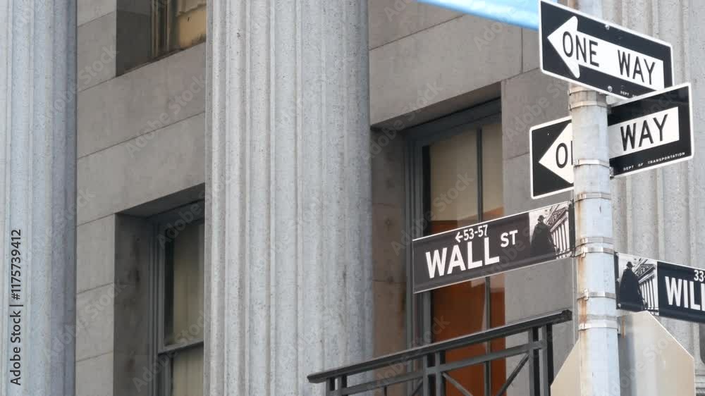 New York City United States. Lower Manhattan Downtown Financial District urban architecture. American Wall street road sign near Stock Exchange building, USA Stock Market. One way traffic arrow sign. New York City United States. Lower Manhattan Downtown Financial District urban architecture. American Wall street road sign near Stock Exchange building, USA Stock Market. One way traffic arrow sign.