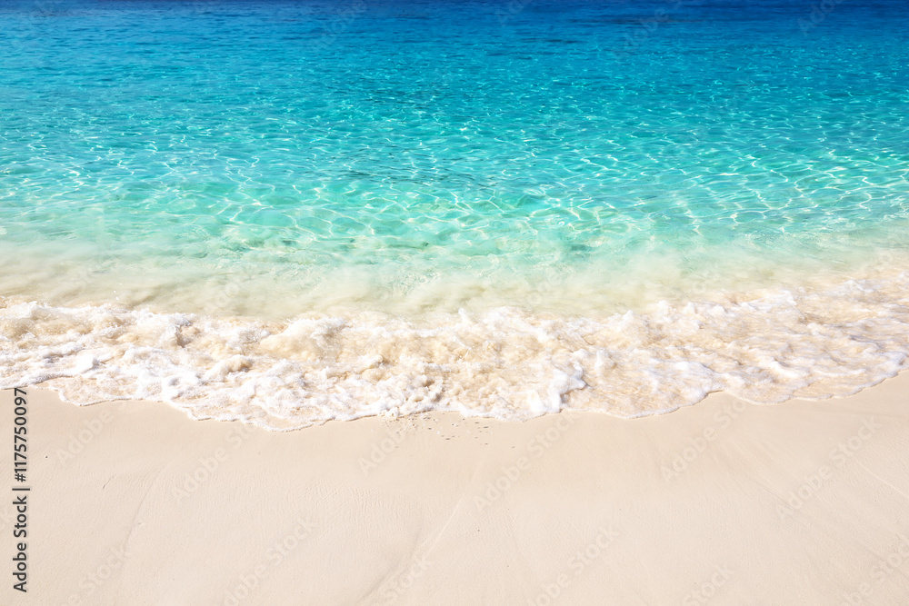 Beautiful white sand beach with turquoise water on a sunny day in Similan Islands near Phuket, Thailand. Beautiful white sand beach with turquoise water on a sunny day in Similan Islands near Phuket, Thailand.