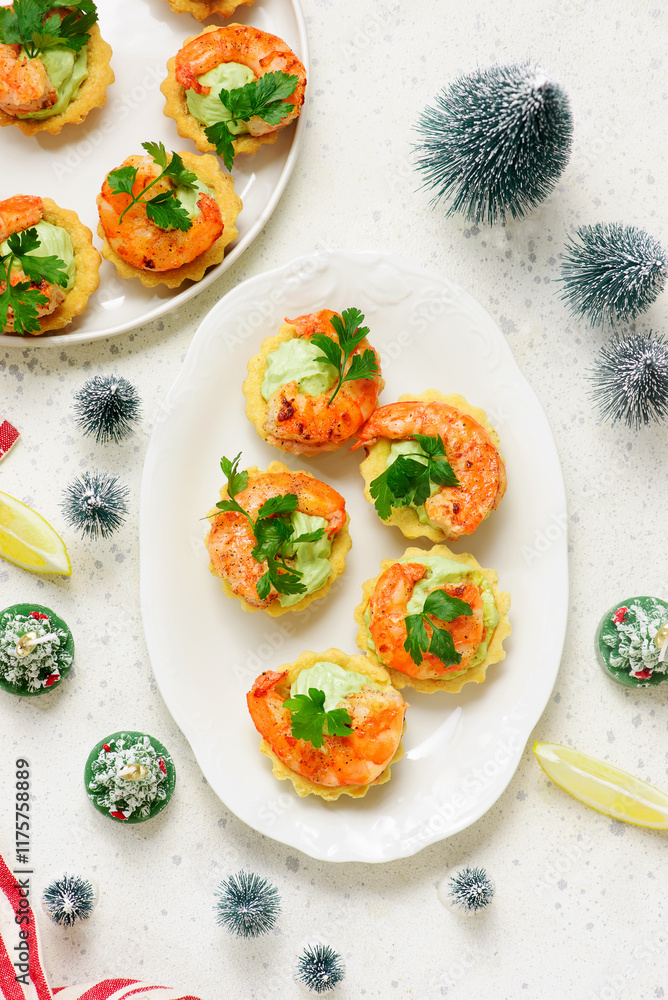 Tartlets with cream cheese, avocado and shrimps..top view.style hugge Tartlets with cream cheese, avocado and shrimps..top view.style hugge
