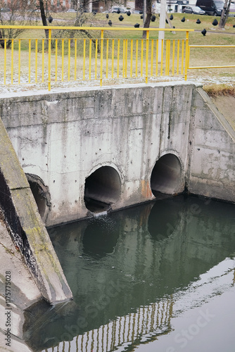 drain pipe or effluent or sewer release wastewater into river. Sewage or domestic wastewater or municipal wastewater that is product by community of people. waste water is any water that has been use photo