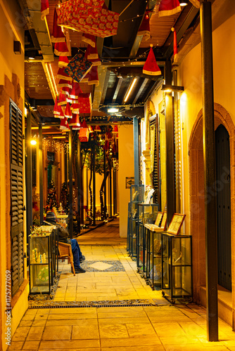 Narrow street with christmas decorations on the street in city Nicosia, Cyprus