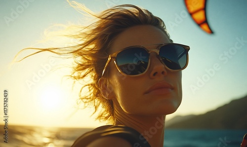 Woman kitesurfing sunset ocean beach (1)