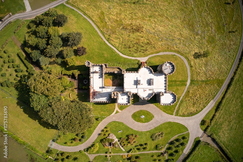 Top-down aerial photograph of the beautifully restored Killua Castle, showcasing its grounds and pathways, County Westmeath, Ireland. photo