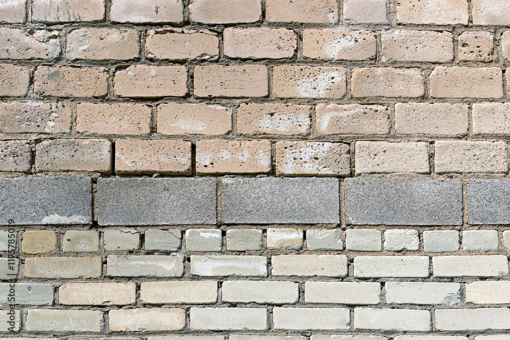 the building wall is made of white silicate bricks and cinder blocks. texture for background the building wall is made of white silicate bricks and cinder blocks. texture for background