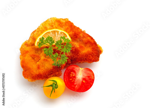 Wiener Schnitzel vor weißem Hintergrund photo