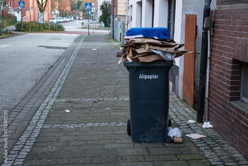 Old German Town on a Clear Day with Paper Recycling Bin