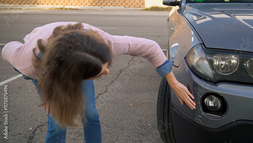 Obraz na płótnie Woman examining damage on car bumper after traffic accident w salonie