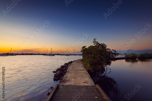 Sunset over the Indian River, Shepards Park in Stuart, Florida photo