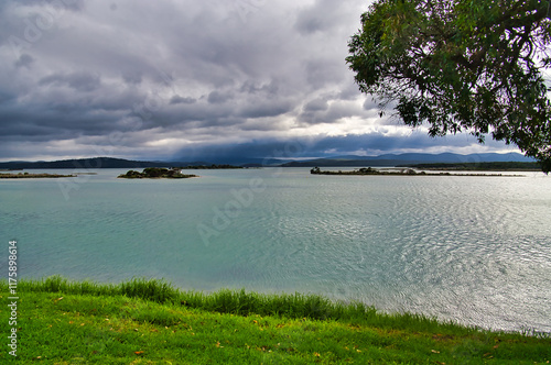 The Mallacoota Inlet, Wallagaraugh River, Gippsland, in the extreme northeast of Victoria, Australia, on a cloudy day with threatening rain
 photo