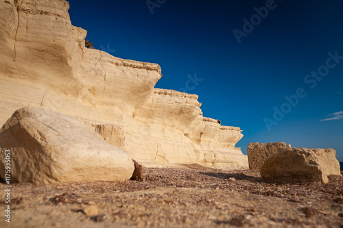 Sandstone rocks eroded by waves; Paramali beach; Cyprus photo