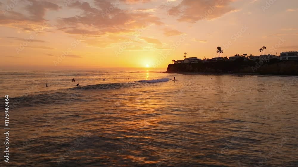 Riding the Waves: Aerial Shot of Surfing at Golden Sunset in San Diego, California Riding the Waves: Aerial Shot of Surfing at Golden Sunset in San Diego, California