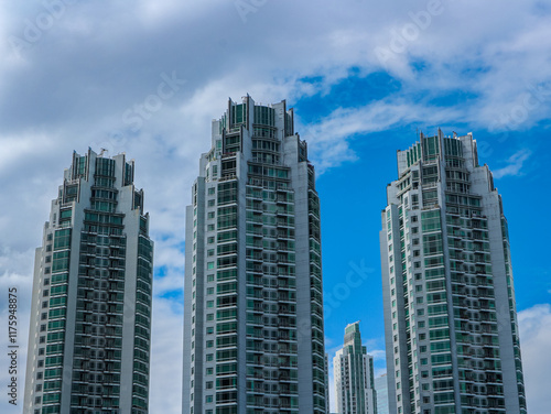 Low angle view of skyscraper with glass window and clear sky background for business and finance concept
