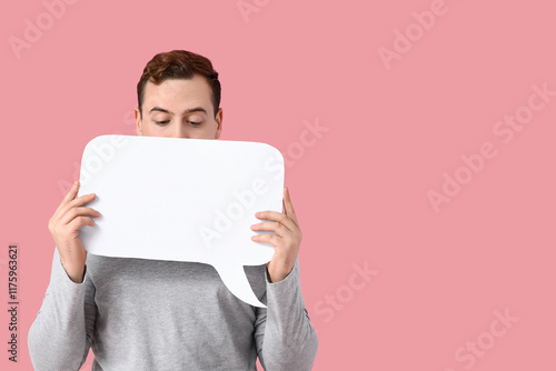 Young man with blank speech...