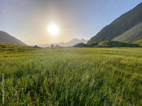 Hiking near Neue Regensburger Hut at Stubai High Trail (Stubaier Höhenweg), one of the most beautiful high-altitude hikes in austrian Alps, near stubai glacier and Innsbruck in summer, Tirol Austria photo