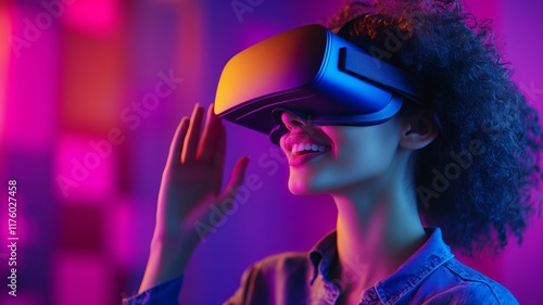A joyful woman wearing a VR headset immersed in a vibrant digital experience with colorful neon lights