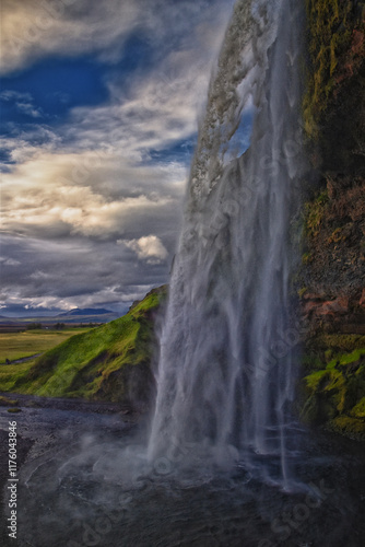 Seljalandsfoss waterfall summer 2024 at sunset including Gljúfrabúi falls off Ring Road Iceland, Scandinavia, Europe.