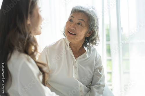 Portrait of enjoy happy love asian family senior mature mother and young daughter smiling play laughing and having fun together at home, care, elderly, insurance.happy family and Mother Day concept Free Download Portrait of enjoy happy love asian family senior mature mother and young daughter smiling play laughing and having fun together at home, care, elderly, insurance.happy family and Mother Day concept - GFXLoad