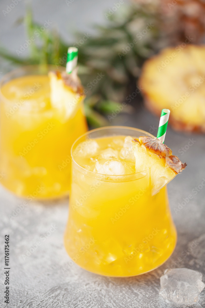 Fototapeta premium Fresh pineapple alcoholic cocktail with ice. Summer cocktail and bar concept.